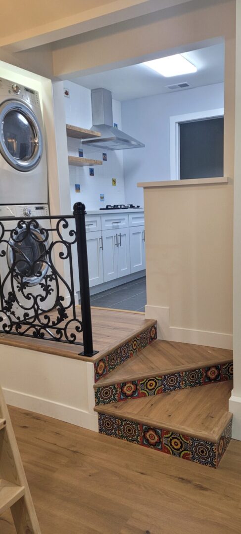 Kitchen with decorative staircase
