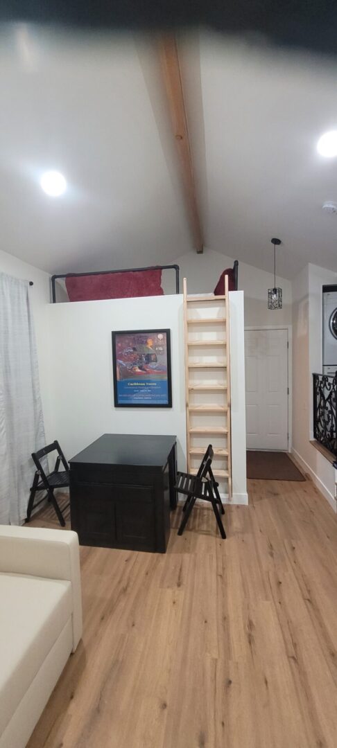Small loft with wooden ladder